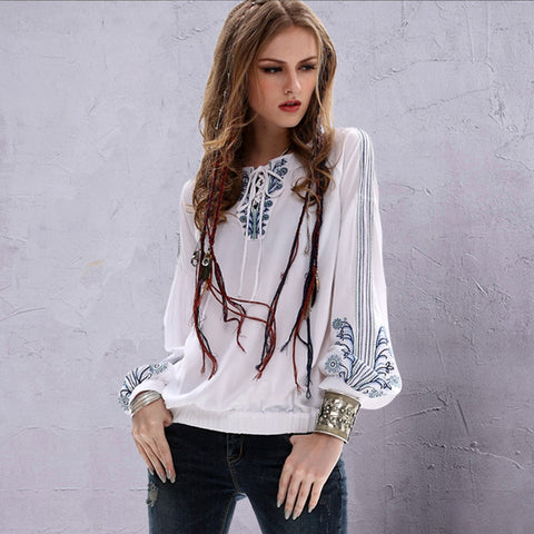 Embroidered drawcord pullover blouses