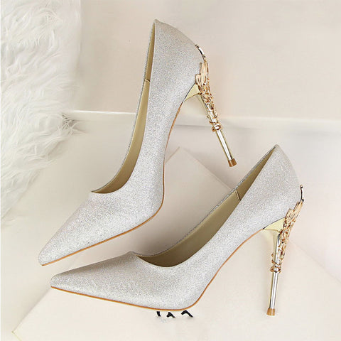 Women's pointed toe high heeled pumps