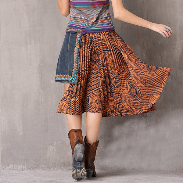 Pleated openwork asymmetric skirt