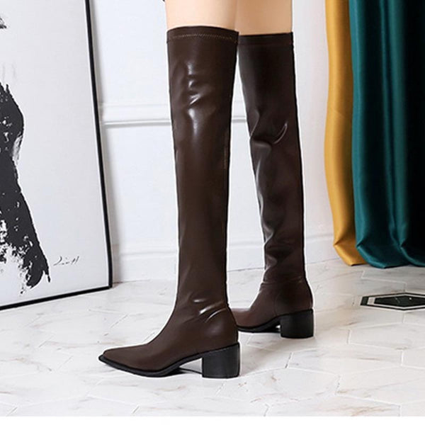 Brief pointed toe knee length boots