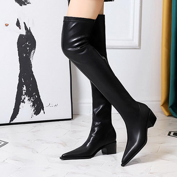 Brief pointed toe knee length boots