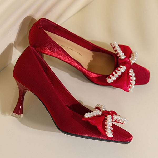 Low fronted bow tie solid pointed heels with pearls