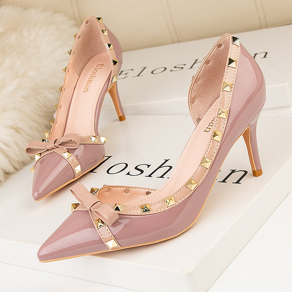 Rivet embellished side cut out pointed toe stiletto heels