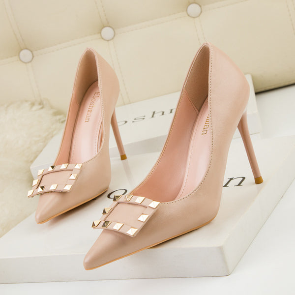 Pointed toe metal rivet stiletto heels
