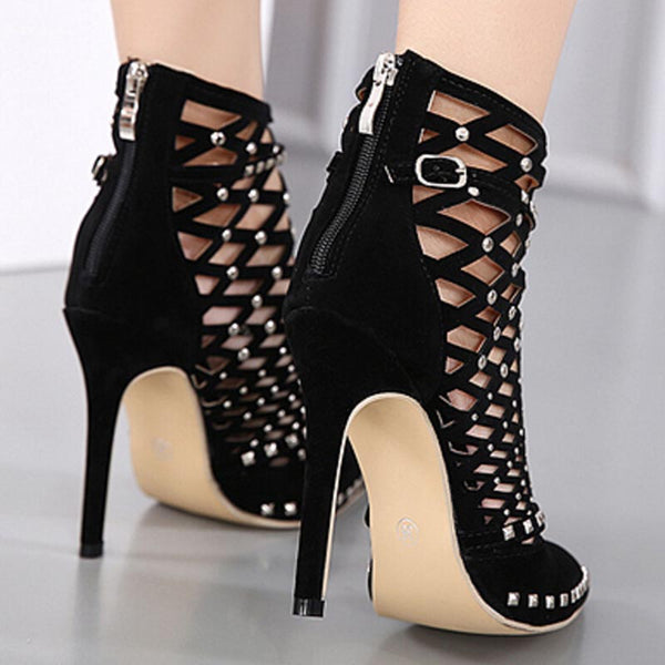 Pointed toe openwork rivet boots