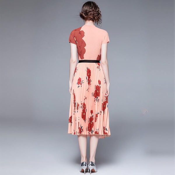 Stylish pink print mock neck long sleeve tops and pleated printed skirts suits