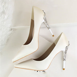 Women's pointed toe high heeled pumps