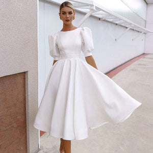 White puff sleeve cut out back skater dresses