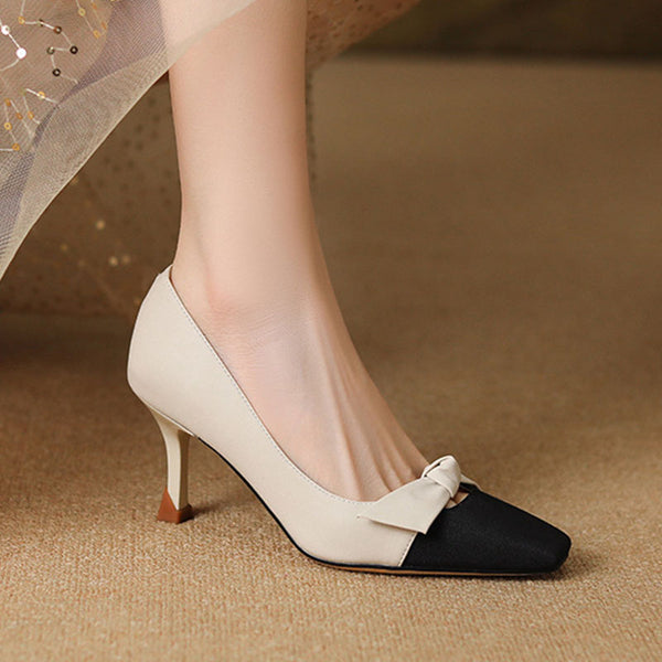Pretty contrasting bow-embellished high heels for women