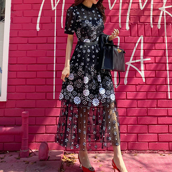 Black semi-sheer embroidered a-line dresses