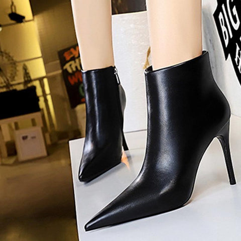 Thin heeled pointed toe ankle boots