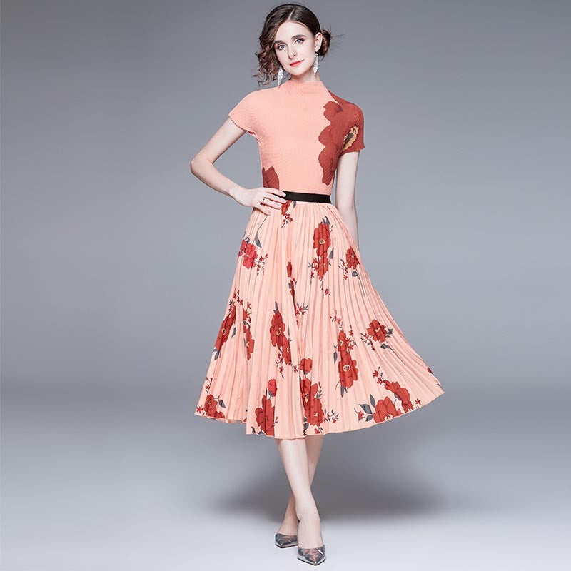 Stylish pink print mock neck long sleeve tops and pleated printed skirts suits