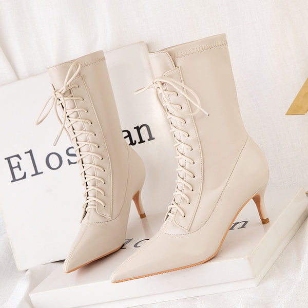 Solid lacing pointed toe heeled boots