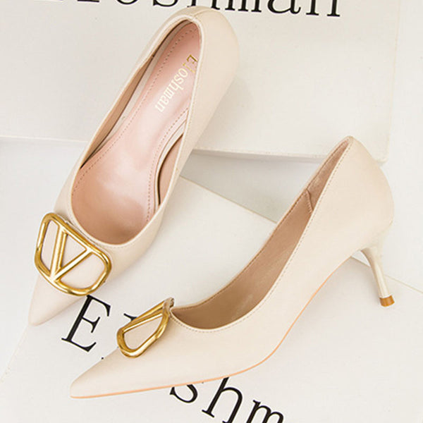 Metal letter embellished pointed toe heels