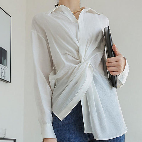 Brief lapel  twist long sleeve irregular blouses