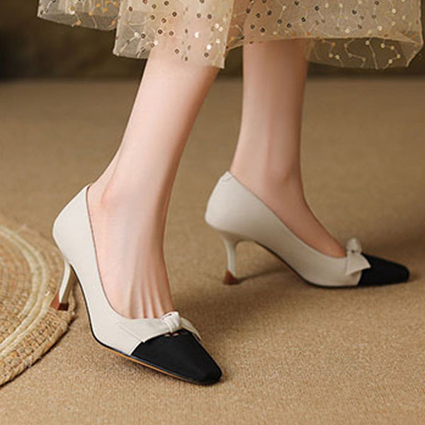Pretty contrasting bow-embellished high heels for women