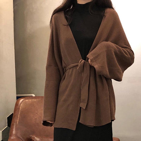 Casual black mock neck knitting dresses and brown belted cardigans